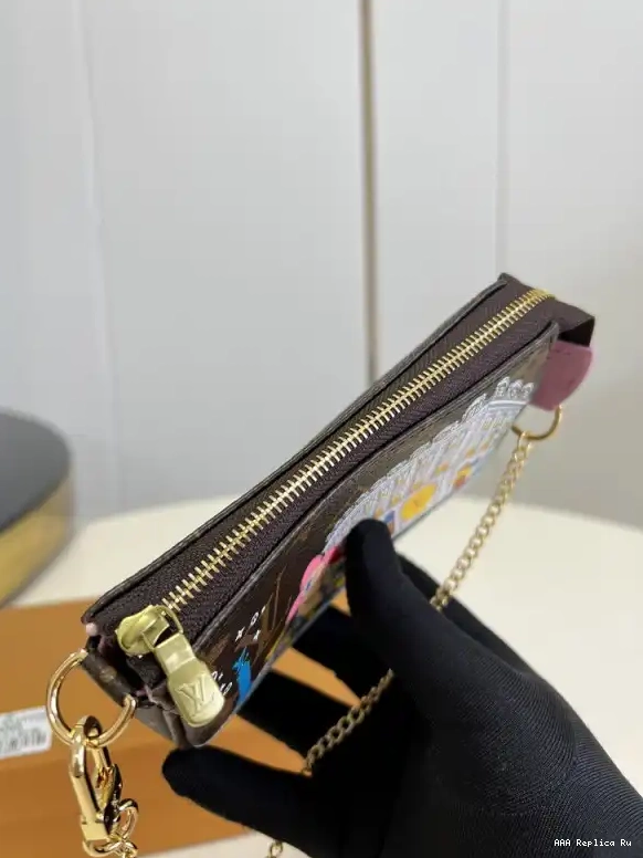AAA Replica Ru LOUIS VUITTON POCHETTE ACCESSOIRES MINI 0514